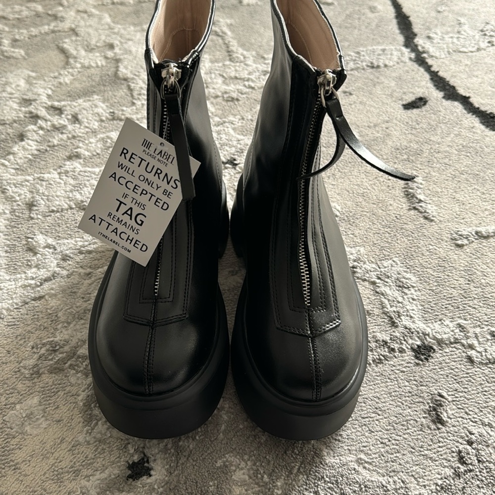 BRAND NEW never worn zipper black boots